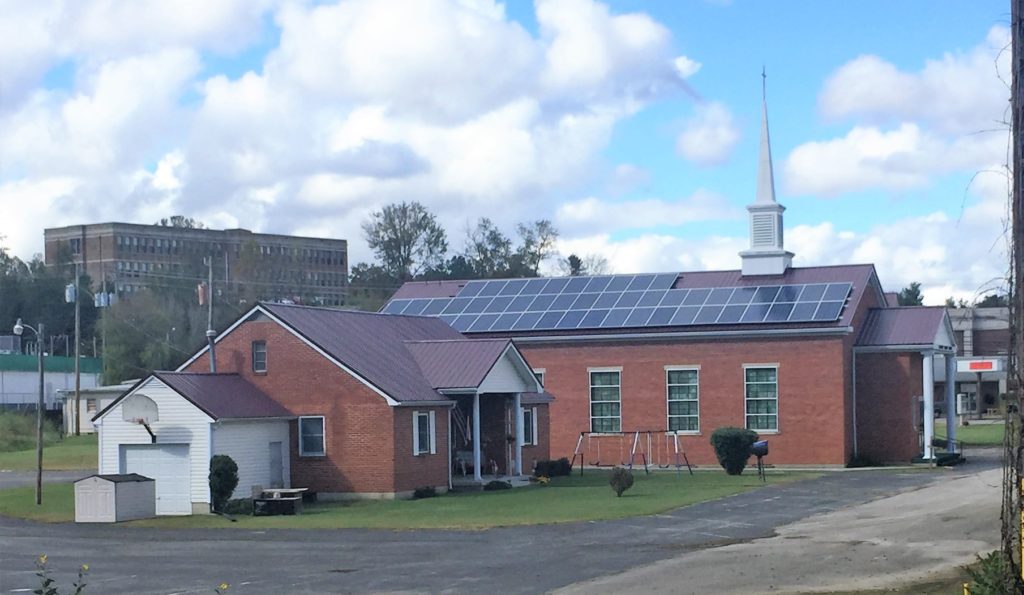 Solar PV panels sit on the roof at Campton Baptist Church in Wolfe County. Many Eastern Kentucky churches struggle with their bills