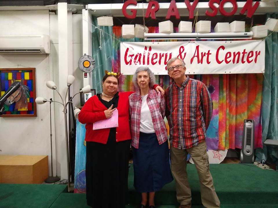 Three winners of the grayson art gallery poetry slam. The Holler down the holler slams are held in the carter county community