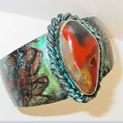 This bracelet shows how Nora Swanson Arts uses a lot of turquoise and Kentucky agate in the jewelry she makes in Berea, Kentucky