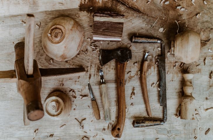 Several tools lay on a table in the studio of Sunhouse craft, a berea kentucky based arts studio. MACED supports them with a business loan