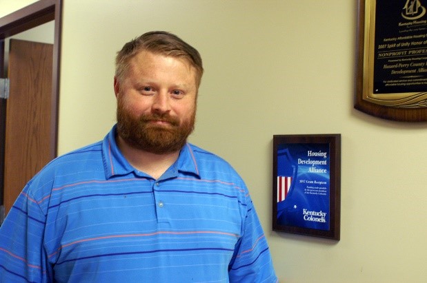 Frank Morris stands in the office at HDA in Hazard, KY.  He manages the Appalachia Heat Squad to do energy efficiency for Eastern KY homes