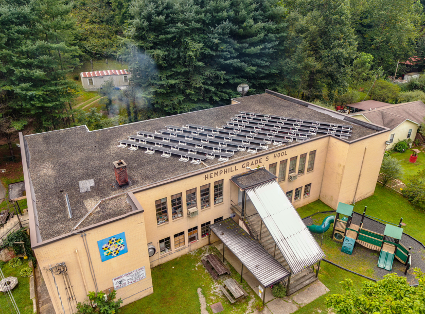 an aerial view of Hemphill community center showing the playground and solar panels