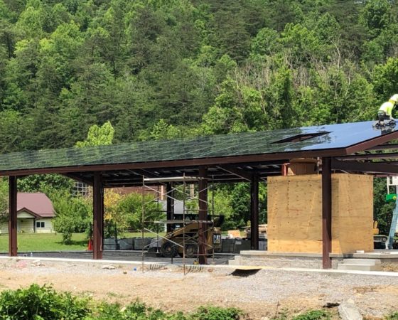 building with solar panels under construction