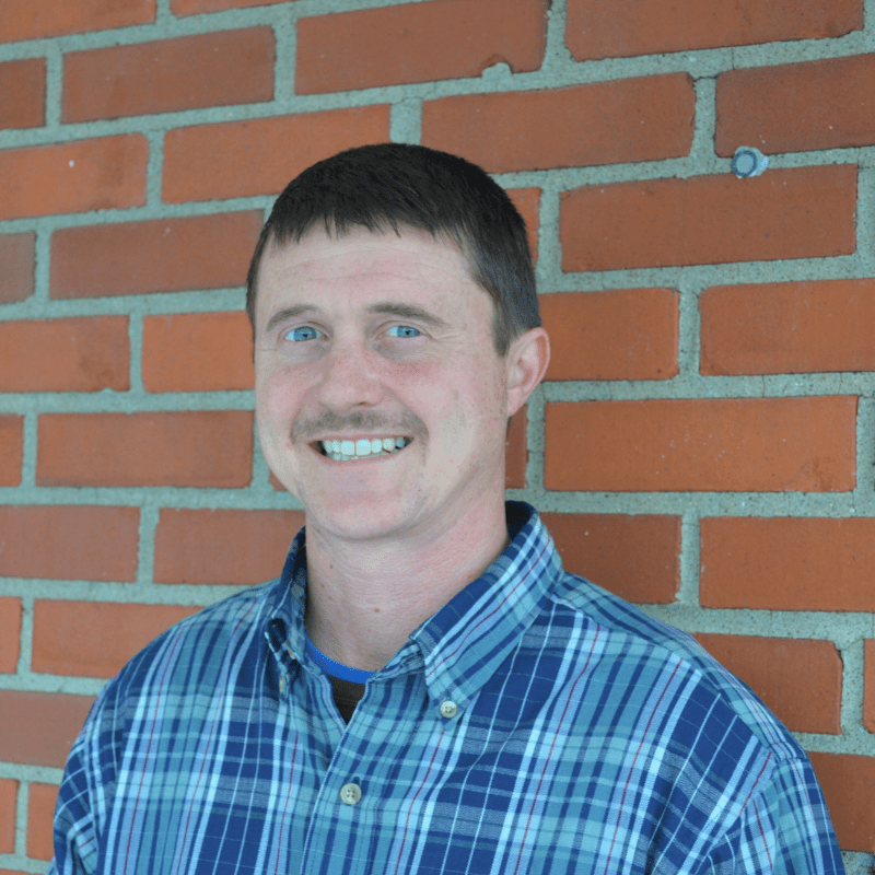 Ben Tatum smiles for his MACED New Energy internship portrait. He lives in Pine Ridge near Campton, Kentucky in the Red River Gorge.