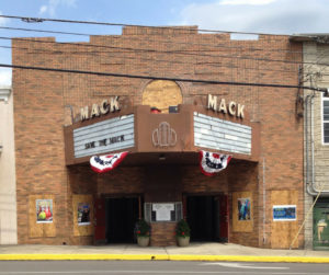 The front of a building in estill county kentucky. The mack theater is being restored by the community in irvine