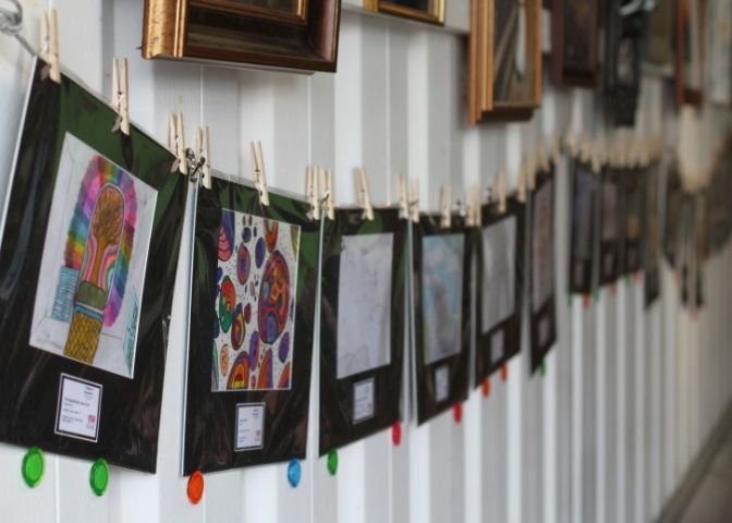 Children's art hangs on a wall at Grayson Gallery and Art Center in Carter County, Kentucky, a town in Eastern kentucky.