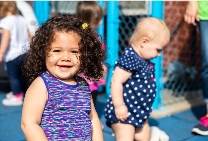 Two kids play at a daycare in Eastern Kentucky. Many childcare centers are closing due to covid-19.