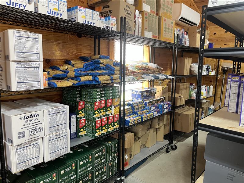 The pantry shelves in Lend A Hand's existing building