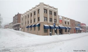 A modern photo of first federal saving and loan. There is snow on the street.