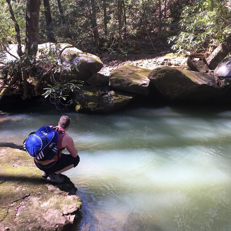 Jared looks for rocks and other item in Pulaski County Kentucky for Fishing Creek Jewelry. MACED supports artists like Jared with loans