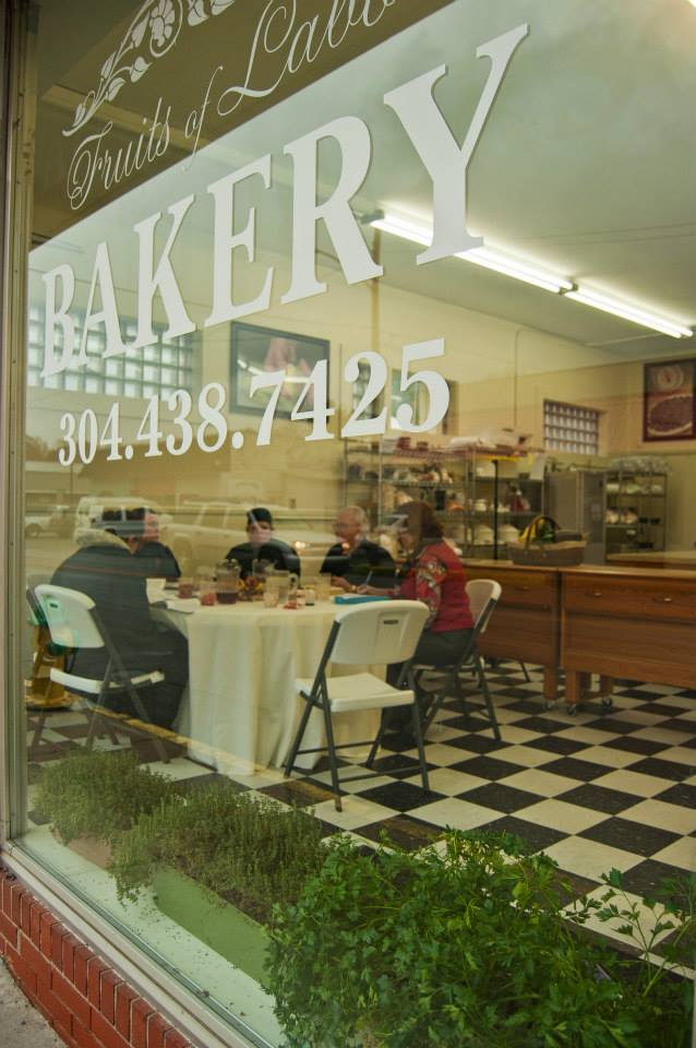 Part of the students training is to also learn food presentation and serving skills. The cafe window in Rainelle, West Virginia, is labeled Fruits of Labor.