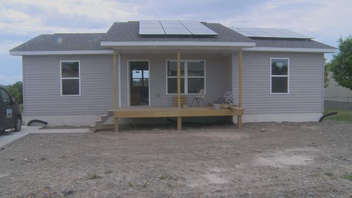 Panels on the roof of Housing Development Alliance's first ever solar home. MACED’s Josh Bills worked with HDA on the solar