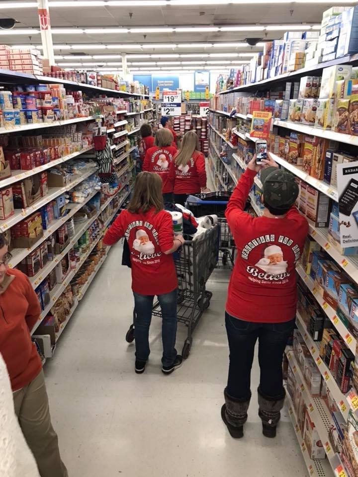 Volunteers with Kent Rose Foundation get supplies for kids and young people in eastern kentucky.