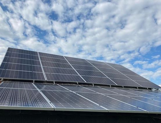 Solar panels on top of a barn at lazy eight stock farm in garrard county, kentucky.