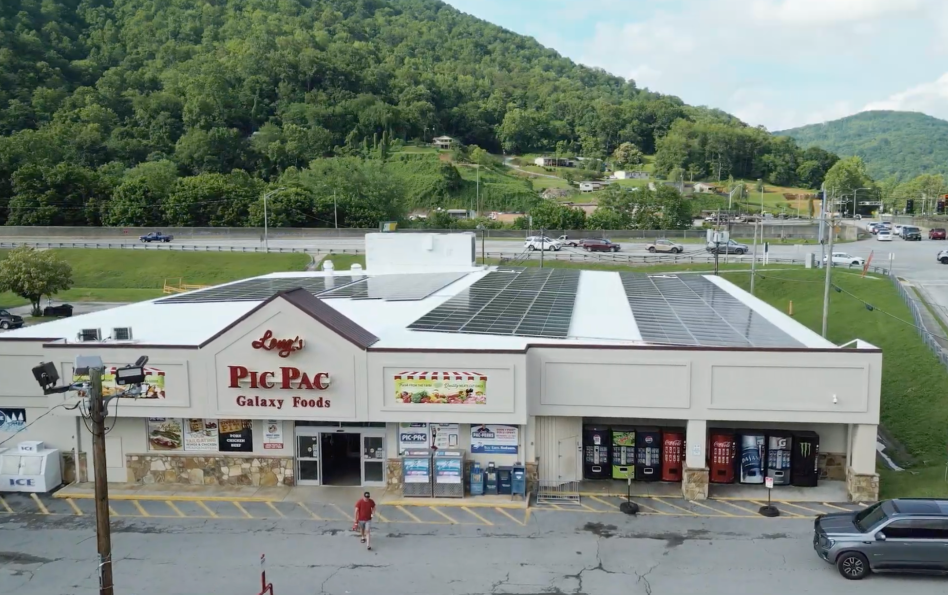 Long's pic pac with solar on the rooftop and mountains in the background.