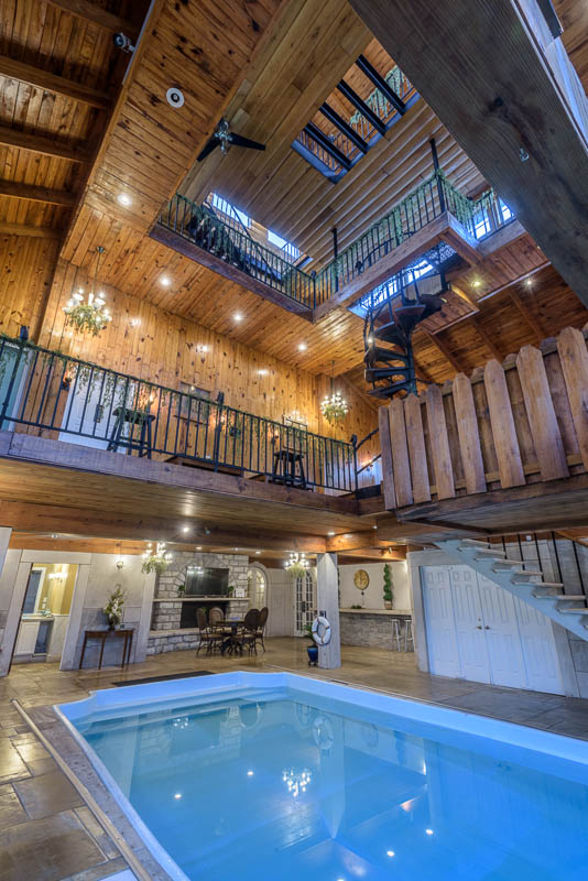 A swimming pool and multiple levels of the house inside longview estate in garrard county.