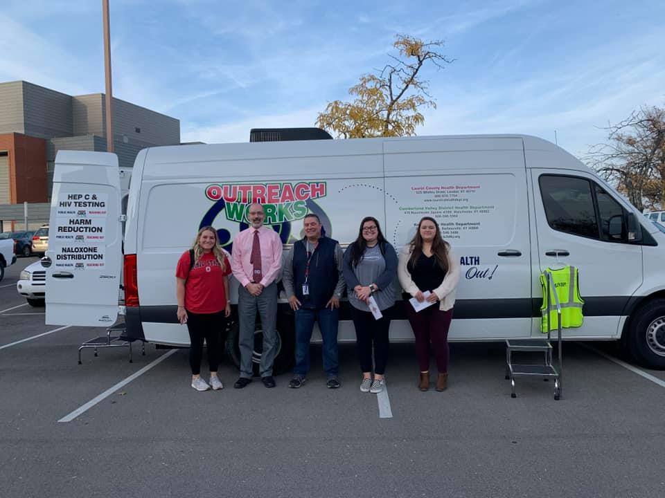 Knox, Laurel, Clay and Jackson Counties partners are shown with their Mobile Harm Reduction Unit, a van that travels eastern kentucky.