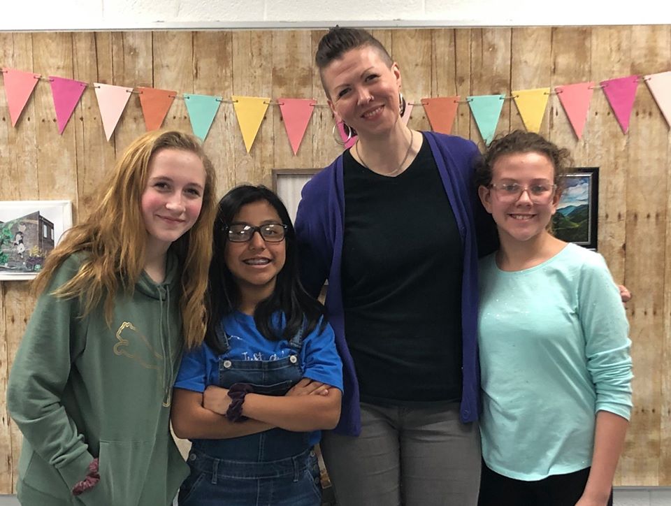 Lacy with young women at Carr Creek Elementary in Knott County, her old grade school, for Our Town project. Lacy is an Appalachian aritst