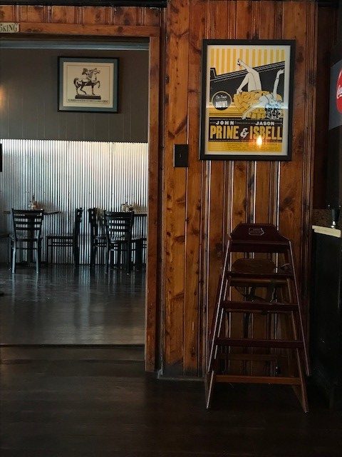 Chairs and a wall at the steam engine pizza pub. Estill county is a live music destination and is building a music industry in eastern kentucky